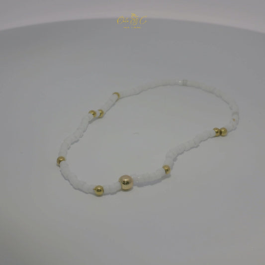 Elegant White and Gold Bracelet